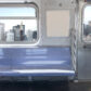 Subway seats and blank billboard in New York